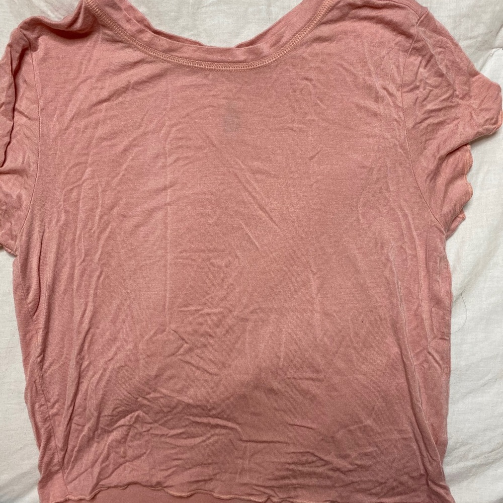 Ruffled pink shirt